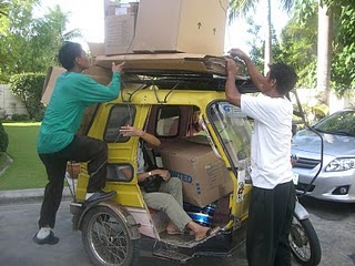 Imelda (cauayan mission home house keeper), Ronnie (home groundskeeper), & Ronnie (Church facilities group ) making good use of Sis Carlos' boxes. Off to sell them. Imelda (cauayan mission home house keeper), Ronnie (home groundskeeper), & Ronnie (Church facilities group ) making good use of Sis Carlos' boxes. Off to sell them.